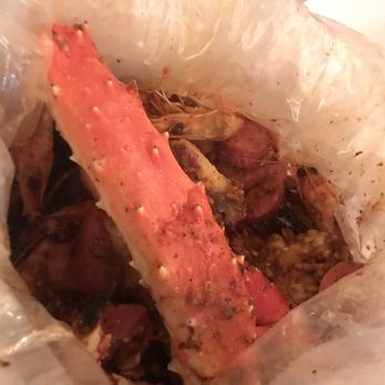 Cap't Loui - You will keep finding more seafood in that bag. - Cajun/Creole Near Me - New York, New York