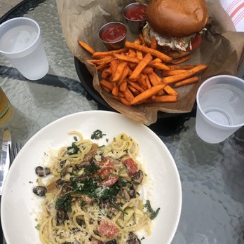 Lumberyard - Grilled Chicken Sandwich and Angel Hair pasta with mushrooms, and artichoke - New American Near Me - Laguna Beach, California Lumberyard - Grilled Chicken Sandwich and Angel Hair pasta with mushrooms, and artichoke - New American Near Me - Laguna Beach, California