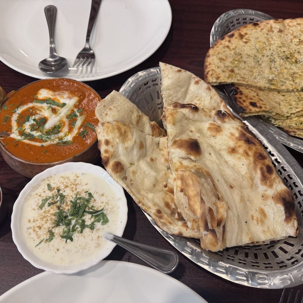 Milaap Indian Kitchen - The spread! One main, and two breads. Very very full for two adults! - Indian Near Me - Coquitlam, British Columbia Milaap Indian Kitchen - The spread! One main, and two breads. Very very full for two adults! - Indian Near Me - Coquitlam, British Columbia