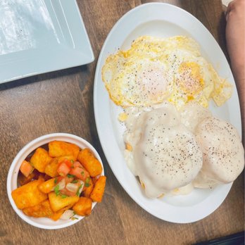 Main Street Bistro - Biscuits and Gravy with a side of potatoes - Breakfast & Brunch Near Me - Hendersonville, Tennessee Main Street Bistro - Biscuits and Gravy with a side of potatoes - Breakfast & Brunch Near Me - Hendersonville, Tennessee