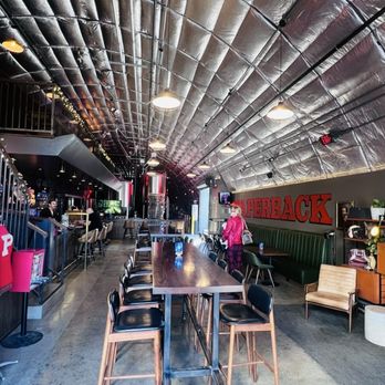 Paperback Brewing - Interior seating area, building used to be an airplane hanger! - Breweries Near Me - Glendale, California Paperback Brewing - Interior seating area, building used to be an airplane hanger! - Breweries Near Me - Glendale, California