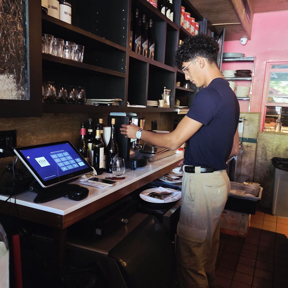 Omar was hard at work but checked on us to make sure everything was satisfactory ! Omar was hard at work but checked on us to make sure everything was satisfactory !