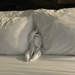 Silver Ridge Lodge - Towel origami on queen bed.