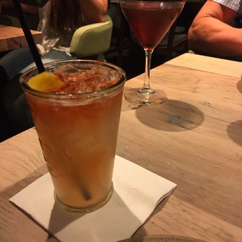 Moku Kitchen - Makawao Ave and Manhattan... How come he didn't get a cocktail napkin ? - Cocktail Bars Near Me - Honolulu, Hawaii
