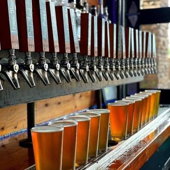 Growler's Taphouse - a row of beer glasses - Sports Bars Near Me - Tucson, Arizona Growler's Taphouse - a row of beer glasses - Sports Bars Near Me - Tucson, Arizona