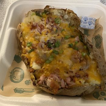 McAlister's Deli - Large Spud Max w/ no olives - only one little square of butter for this big ol' potato - Delis Near Me - Greensboro, North Carolina