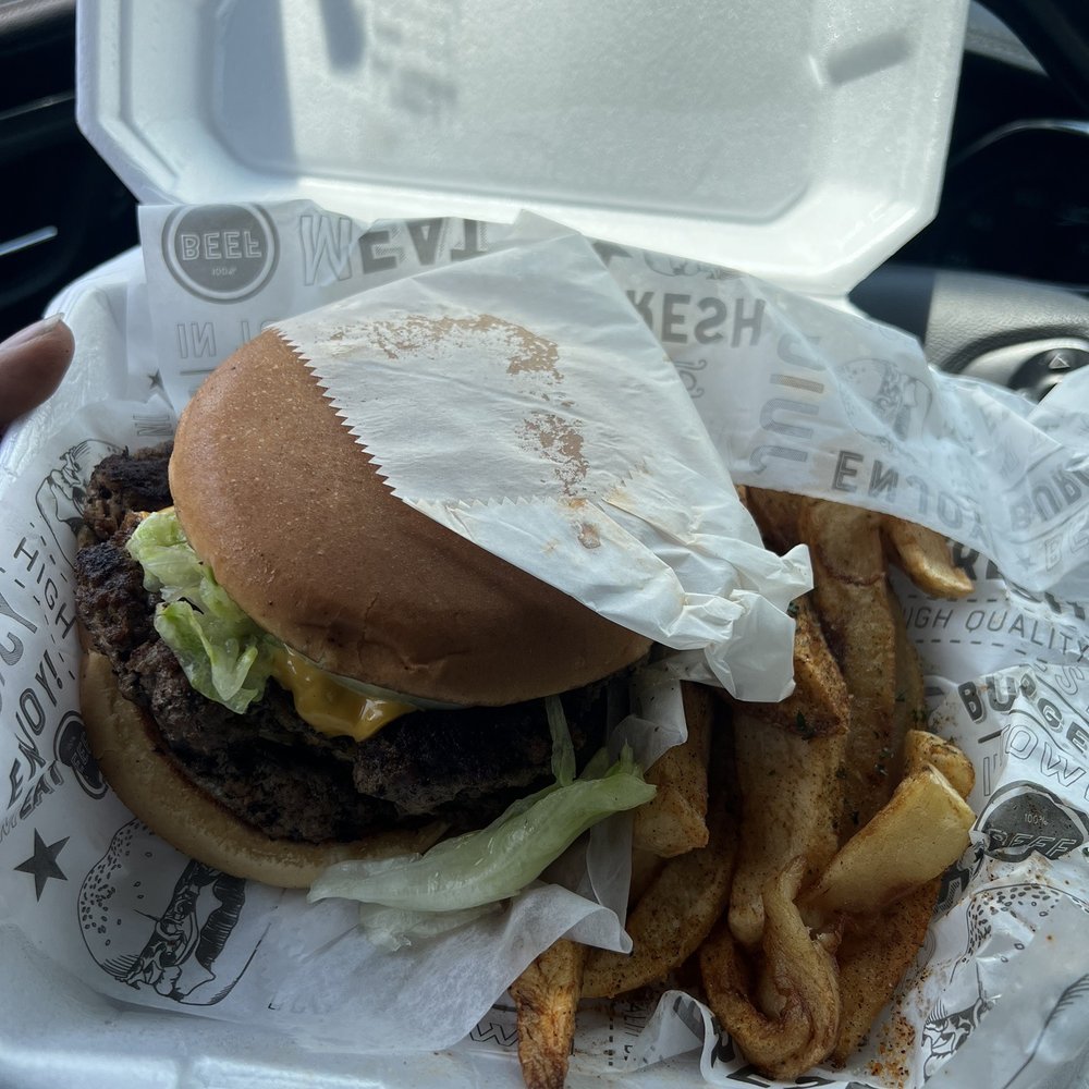 Double Cheeseburger with fry. Double Cheeseburger with fry.