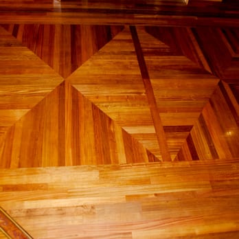 Brian's Masterpiece - An exclusive custom floor. Forget area rugs add a custom pattern to make your living room unique - Flooring Near Me - Las Vegas, Nevada