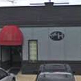 The H - two cars parked in front of a building - Dive Bars Near Me - Deer Park, Ohio