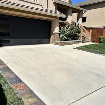 Landscape Plus - a driveway in a residential neighborhood - Landscaping Near Me