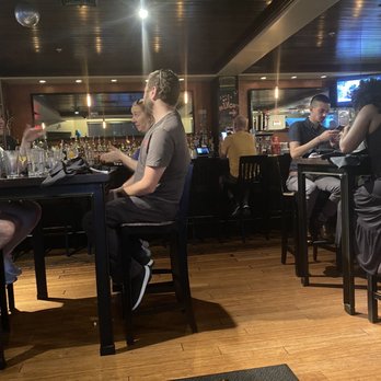 Moonshine 152 - Bar area and high top seating - New American Near Me - Boston, Massachusetts