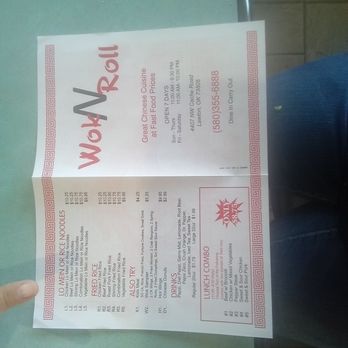 Wok N Roll - a person holding a menu - Chinese Near Me - Lawton, Oklahoma Wok N Roll - a person holding a menu - Chinese Near Me - Lawton, Oklahoma