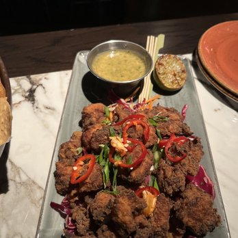 Puttshack - Boston - Thai fried chicken - Mini Golf Near Me - Boston, Massachusetts Puttshack - Boston - Thai fried chicken - Mini Golf Near Me - Boston, Massachusetts