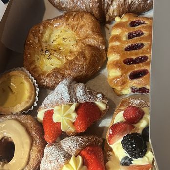 Paris Baguette - Strawberry lemon cream croissant, berry tart, coffee creme filled cronut, almond coconut croissant, egg tart and berry danish. - Bakeries Near Me - Carrollton, Texas Paris Baguette - Strawberry lemon cream croissant, berry tart, coffee creme filled cronut, almond coconut croissant, egg tart and berry danish. - Bakeries Near Me - Carrollton, Texas