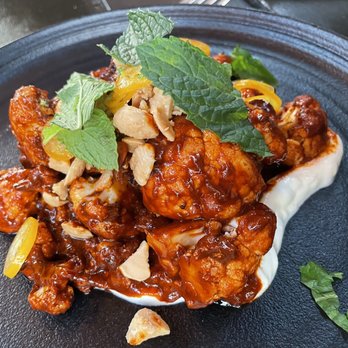 The Lark - Caramelized Cauliflower (harissa, lemon yogurt, marcona almonds, pickled kumquats, mint) - New American Near Me - Santa Barbara, California The Lark - Caramelized Cauliflower (harissa, lemon yogurt, marcona almonds, pickled kumquats, mint) - New American Near Me - Santa Barbara, California