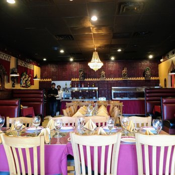 Taj Indian Cuisine - The central dining area-- buffet in the foreground - Indian Near Me - Tampa, Florida Taj Indian Cuisine - The central dining area-- buffet in the foreground - Indian Near Me - Tampa, Florida