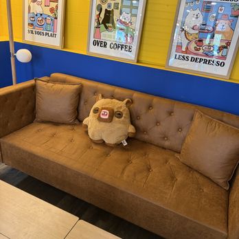 Taste Me - Seating with an adorable pillow/friend - Sandwiches Near Me - Scarborough, Maine
