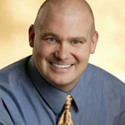 Smiles of Distinction Dentistry - Dr. Bart Schultz