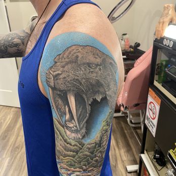 Another Tattoo Studio - Background added to sabertooth - Tattoo Near Me - Clarksville, Tennessee