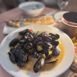 Jonathan's The Rub Bridgeland - Love. This white wine sauce was great. Thought I could finish two orders of mussels.