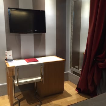 Hotel Morgana - Flat screen tv has USB and HDMI connections - nice IKEA mirror on the side. - Hotels Near Me - Rome, RM
