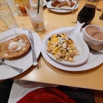 Wild Eggs - Mushroom and garlic scramble with french toast and cinnamon pecan grits!!, Added chicken to scramble - Breakfast & Brunch Near Me - Indianapolis, Indiana Wild Eggs - Mushroom and garlic scramble with french toast and cinnamon pecan grits!!, Added chicken to scramble - Breakfast & Brunch Near Me - Indianapolis, Indiana