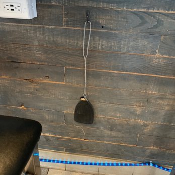 Star Bar Grill - A fly shatter under bar - American Near Me - Branson, Missouri