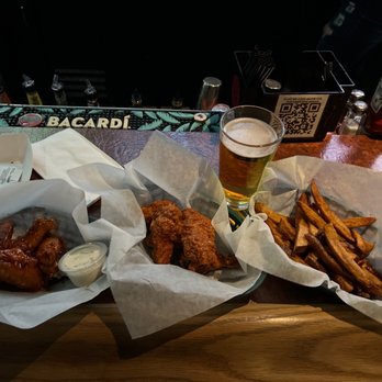 Pounders Bar & Grill - Thai hot, parm hot and fries - Bars Near Me - Cleveland, Ohio Pounders Bar & Grill - Thai hot, parm hot and fries - Bars Near Me - Cleveland, Ohio