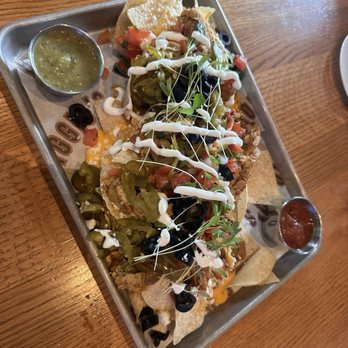Biggio's - Nachos with a little bit of chicken - Sports Bars Near Me - Houston, Texas Biggio's - Nachos with a little bit of chicken - Sports Bars Near Me - Houston, Texas
