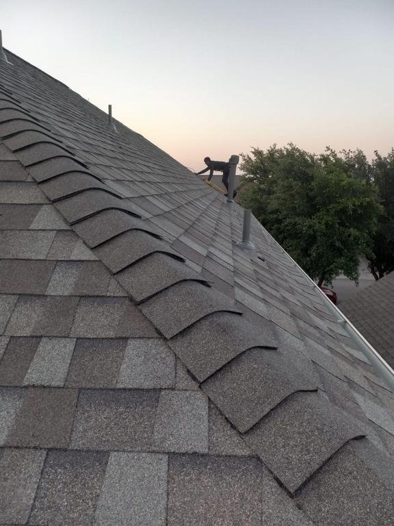 Slide of Truly Roofing & Construction