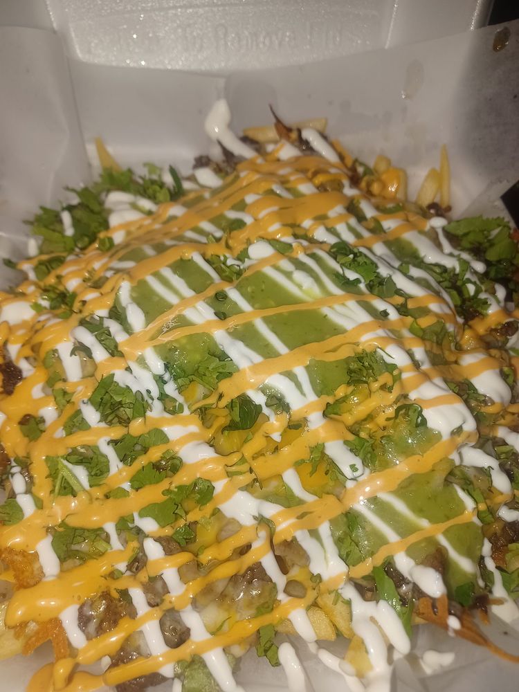 Food from Tacos El Pelon Ricardo Torres