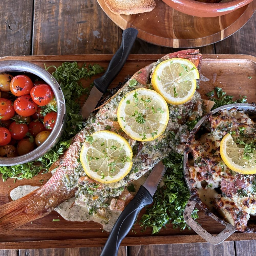 The Oyster Shack - Whole Snapper (daily catch) with roasted tomato salad and Parmesan potatoes - Seafood Near Me - San Juan, Puerto Rico The Oyster Shack - Whole Snapper (daily catch) with roasted tomato salad and Parmesan potatoes - Seafood Near Me - San Juan, Puerto Rico