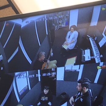 Guitar Center Lessons - Close up of people taking lessons - Musical Instruments & Teachers Near Me - Rancho Cucamonga, California
