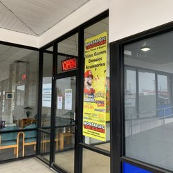 Nostalgic Video Games - A poster of the shop.