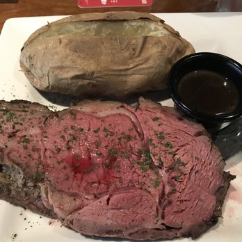 Murphy's Pub - Perfectly cooked and seasoned prime rib with potato and salad. Tender and delish. - Irish Near Me - Agawam, Massachusetts Murphy's Pub - Perfectly cooked and seasoned prime rib with potato and salad. Tender and delish. - Irish Near Me - Agawam, Massachusetts