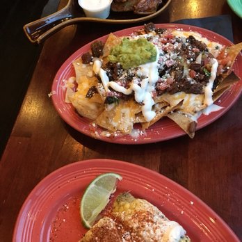 Te'Kila - Elote, Te'Kila lime wings and steak nachos. The wings were way too tart! However the elite and nachos were sooo good!!! - Bars Near Me - Los Angeles, California Te'Kila - Elote, Te'Kila lime wings and steak nachos. The wings were way too tart! However the elite and nachos were sooo good!!! - Bars Near Me - Los Angeles, California