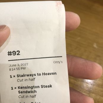 Ozzy's Burgers Vaughan - a hand holding a receipt - Burgers Near Me - Vaughan, Ontario Ozzy's Burgers Vaughan - a hand holding a receipt - Burgers Near Me - Vaughan, Ontario
