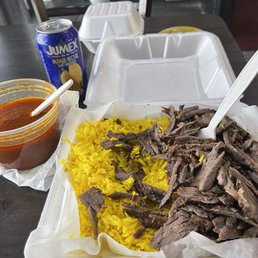 shredded beef and rice in a styrofoam container shredded beef and rice in a styrofoam container