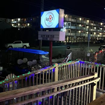 The Spot - a view of a motel at night - New American Near Me - Carolina Beach, North Carolina The Spot - a view of a motel at night - New American Near Me - Carolina Beach, North Carolina