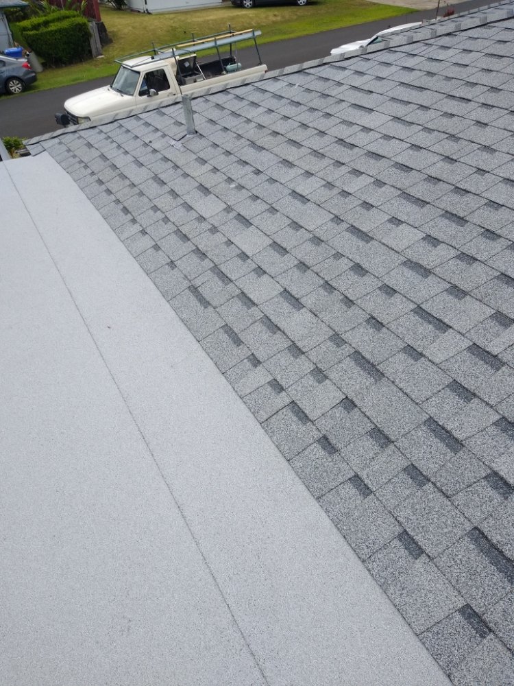 Slide of J&E ROOFING