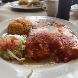 Enchilada plate with rice and beans Enchilada plate with rice and beans