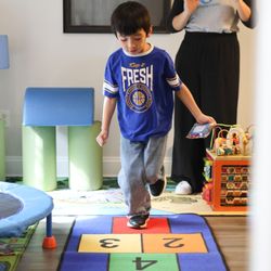 Using natural environments and play based therapy.