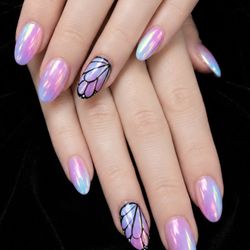 Pure Nails Spa - Butterfly chrome hits different under the light Soft, dreamy, and just enough glow to make every hand movement look magical.