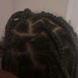 Mia Hair Braiding - Haphazard grid. Grabbing hair from one box and simply merging it in with others.