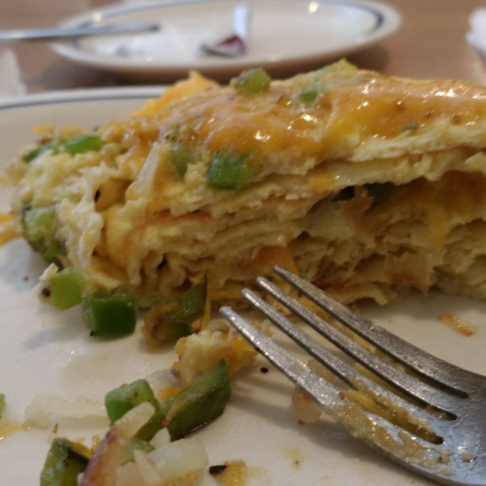 This was the Omlet o ordered. I ate part a bit much to my regret. I tip the waitress 50% because I felt sorry for her for working there. This was the Omlet o ordered. I ate part a bit much to my regret. I tip the waitress 50% because I felt sorry for her for working there.
