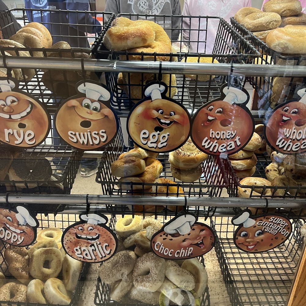 a display of bagels and other pastries a display of bagels and other pastries