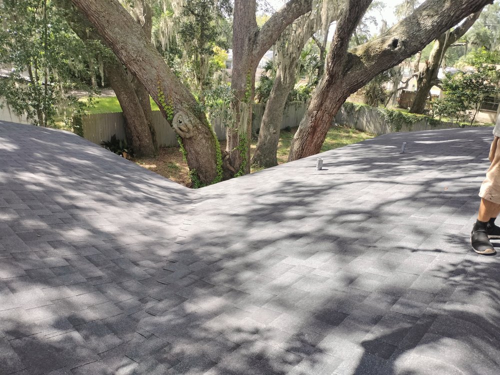 Slide of Land Roofing Company