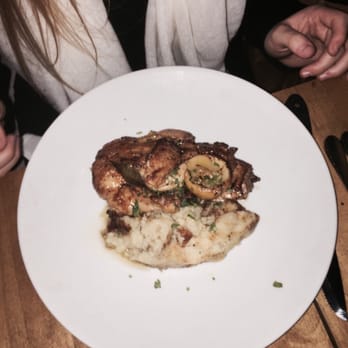 Coppa Osteria - The half roasted grilled chicken with a side of polenta. - Italian Near Me - Houston, Texas Coppa Osteria - The half roasted grilled chicken with a side of polenta. - Italian Near Me - Houston, Texas