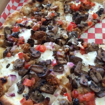Pizza 900 Wood fired Pizzeria - Garlic herb Oil, chili oil, mozzarella , goat cheese, sausage, tomatoes, red onions, extra roasted mushrooms - Pizza Near Me - Laguna Hills, California Pizza 900 Wood fired Pizzeria - Garlic herb Oil, chili oil, mozzarella , goat cheese, sausage, tomatoes, red onions, extra roasted mushrooms - Pizza Near Me - Laguna Hills, California