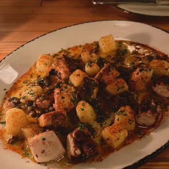 Nancy's Hustle - Octopus in olive oil, very good but very heavy. Could only eat a couple bites - New American Near Me - Houston, Texas